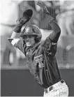  ?? Brad Tollefson / Associated Press ?? Texas Tech's Gabe Holt celebrates after scoring the final run against Duke.