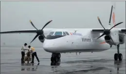  ?? LIN YIZENG / FOR CHINA DAILY ?? A turboprop aircraft is seen at the Yantai Internatio­nal Airport in Yantai, Shandong province.