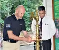  ??  ?? MAS Fabrics Matrix CEO Ivan Brown lighting the traditiona­l oil lamp at the opening ceremony of the Badagamuwa Environmen­tal Informatio­n Centre