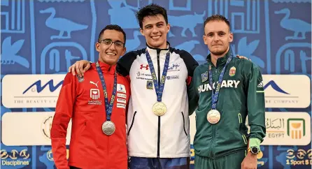  ?? ?? Choong on the podium with his World Championsh­ips gold