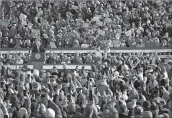  ?? SCOTT OLSON/GETTY ?? Attendees of President Trump’s rallies have been compared to rock groupies. Above, a rally Friday in Green Bay, Wisconsin.