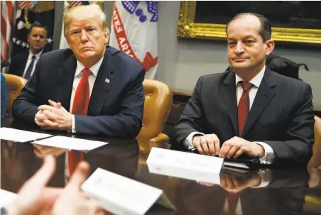  ?? Evan Vucci / Associated Press 2018 ?? President Trump and Labor Secretary Alex Acosta attend a meeting on labor issues last year at the White House.