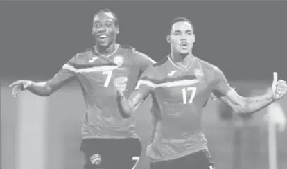  ??  ?? Alvin Jones (right) celebrates with Nathan Lewis following his wonder strike for Trinidad and Tobago in the World Cup qualifier against United States on Tuesday night.