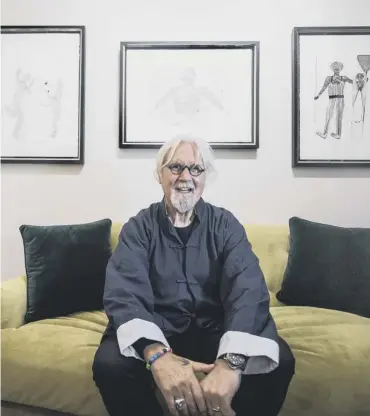  ??  ?? 0 Sir Billy Connolly with some of his latest ink drawings at the Castle Fine Art gallery in Glasgow