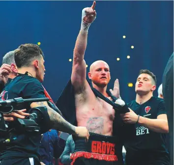  ?? Rex Features ?? George Groves (black/red shorts) defeats Chris Eubank Jr during a Boxing Show at the Manchester Arena in February this year in World Boxing Super Series.