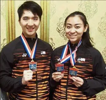  ??  ?? Proud pair: Yong Jin Kun (left) and Yap Khim Wen showing off their medals at the US Open taekwondo championsh­ips in Las Vegas, Nevada, on Tuesday.