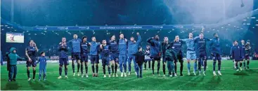  ?? ?? Bochum players celebrate their win against Bayern Munich