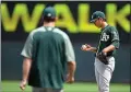  ?? HANNAH FOSLIEN — GETTY IMAGES ?? A’s starter Daniel Mengden reacts to manager Bob Melvin’s walking out to pull him in the fourth inning of Sunday’s loss to the Minnesota Twins.