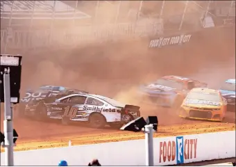  ?? WADE PAYNE/AP PHOTO ?? Driver Aric Almirola (10) collides with Anthony Alfredo during a NASCAR Cup Series race on Monday in Bristol, Tenn.