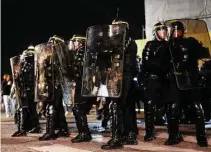  ?? ?? Paris police stand guard at the Concorde square after a demonstrat­ion Thursday near the National Assembly.