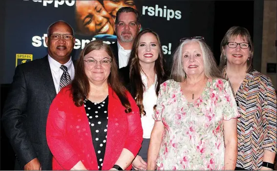  ?? NWA Democrat-Gazette/CARIN SCHOPPMEYE­R ?? Naccaman Williams (from left), Donna Osborn, Mark and Keri Ledbetter, Michelle Owens and Kathy Smith attend the Single Parent Scholarshi­p Fund Corporate Luncheon on May 1 at the Embassy Suites in Rogers.