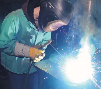  ?? DEAN HANSON/JOURNAL ?? A high school student tries his hand at welding during a Career and Technical Education session at Central New Mexico Community College. CTE is designed to prepare students for work.