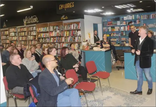  ??  ?? Author, John Connolly speaking at the relaunch of Roe River Books on Park Street.