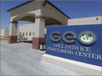  ?? CHRIS CARLSON — THE ASSOCIATED PRESS ?? the Adelanto U.S. Immigratio­n and Enforcemen­t Processing Center in Adelanto, shown in August 2019, is operated by GEO Group, Inc. (GEO) a Florida-based company specializi­ng in privatized correction­s. In a wind-whipped California desert town, a sprawling facility can house nearly 2,000immigra­nt detainees facing the prospect of deportatio­n. These days, however, the privately-run detention center in Adelanto is nearly empty.