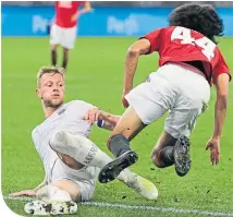  ??  ?? Liam Cooper challenges Manchester United’s Tahith Chong during their pre-season encounter in Perth, Australia