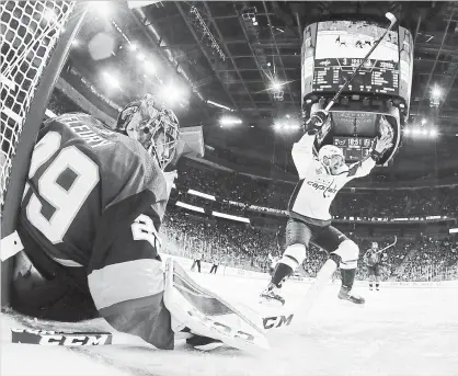  ?? ASSOCIATED PRESS FILE PHOTO ?? Capitals’ Evgeny Kuznetsov celebrates a goal against Golden Knights goaltender Marc-Andre Fleury in Game 1 of the final series.