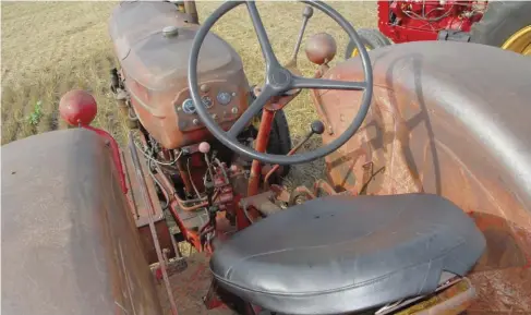  ??  ??  Meyers’ tractor has some anomalies. For whatever reason, M-H made a hand clutch standard for the Western and Riceland tractors. You could order a foot clutch in either if you preferred. The tractor serial number reflected which type, with an “H” for hand clutch (the lever seen to the left in this pic) and “F” for the foot clutch. Not only is this tractor marked both “H” and “F” on the serial number, it has both the linkages in place, though only the foot clutch is hooked up at present. The 555 was never tested at Nebraska and the 55 diesel only once in 1950.