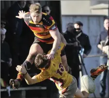  ??  ?? Michael Wells, Sligo RFC, races for possession. Pic: Carl Brennan.