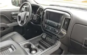  ?? STAFF PHOTO BY MARK KENNEDY ?? The interior of the 2018 Chevy Silverado is shown in Jet Black.