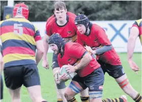  ??  ?? Looking for space EK’s Chris O’Neil eyes an opening against Greenock