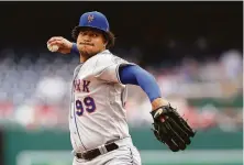  ?? Rob Carr / Getty Images ?? Taijuan Walker pitched seven scoreless innings to help the Mets defeat the Nationals and stay unbeaten in 10 series.