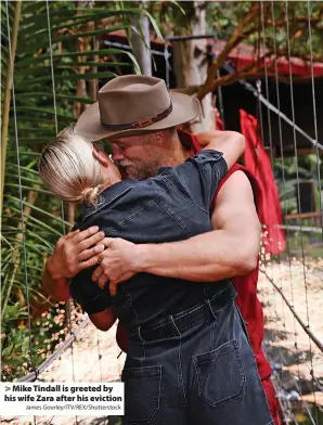  ?? James Gourley/ITV/REX/Shuttersto­ck ?? Mike Tindall is greeted by his wife Zara after his eviction