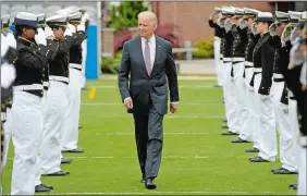  ?? SEAN D. ELLIOT/THE DAY ?? Then-Vice President Joe Biden marches onto Cadet Memorial Field for the 132nd Commenceme­nt at the Coast Guard Academy on May 22, 2013.