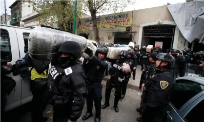  ??  ?? Police raided a drug den last week and found human remains as well as sacks of marijuana. Photograph: STRINGER/Reuters