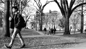  ?? PHOTO: REUTERS ?? A student walks through Harvard Yard at the Harvard University in Cambridge, Massachuse­tts