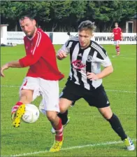  ?? Picture: Les Biggs ?? Whitstable’s Craig Thompson gets a shot in against Fisher