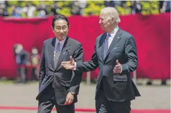  ?? EVAN VUCCI/AP ?? President Joe Biden with Japanese Prime Minister Fumio Kishida on Monday in Tokyo. Biden said any effort by China to use force against Taiwan would “just not be appropriat­e.”