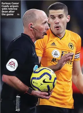  ?? PA ?? Furious: Conor Coady argues with referee Dean after the game