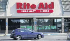  ?? GETTY IMAGES/AFP ?? A sign is posted on the exterior of a Rite Aid store at the Fairmont Center in Pacifica, California.