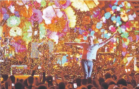  ??  ?? Coldplay lead singer Chris Martin performs during the iHeartRadi­o Music Festival at T-Mobile Arena in Las Vegas, Nevada US, on Sept 22. — Reuters file photo