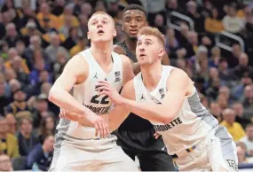  ?? MIKE DE SISTI / MILWAUKEE JOURNAL SENTINEL ?? According to sources Joey (left) and Sam Hauser have decided not to transfer to Wisconsin. Joey Hauser is reportedly going to transfer to Michigan State while Sam will attend Virginia now.