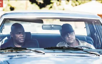  ?? Isabella Vosmikova / USA Network ?? Bokeem Woodbine (left) plays Officer Daryn Dupree and Josh Duhamel is Detective Greg Kading in “The Murders of Tupac Shakur and the Notorious B.I.G.” on the USA Network.