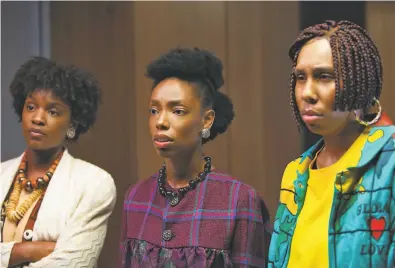  ?? Photos by Tobin Yellan / Hulu ?? Yaani King Mondschein ( left), Elle Lorraine and Lena Waithe in “Bad Hair,” a horror comedy about a woman trying to rise in the late’ 80s music business who gets a demonic weave. The film premieres Friday on Hulu.