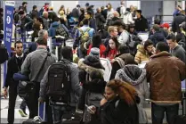  ?? NAM Y. HUH / AP ?? Air travel last year was miserable for passengers in many ways, but industry groups are calling it the safest year ever.