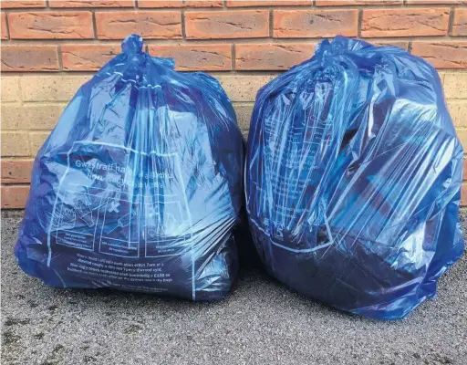  ??  ?? Bridgend council’s limit of two blue bags of rubbish per fortnight has seen recycling rates soar