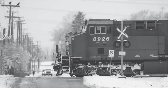  ?? DARRYL DYCK/THE CANADIAN PRESS ?? Critics are worried about CP’s growing reliance on white-collar workers to operate its trains following major job cuts under former CEO Hunter Harrison.