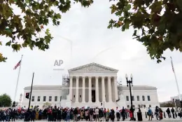  ?? ASSOCIATED PRESS ?? Gun safety and domestic violence prevention organizati­ons gather outside of the Supreme Court before oral arguments are heard in United States v. Rahimi, Tuesday, Nov. 7, 2023, in Washington.