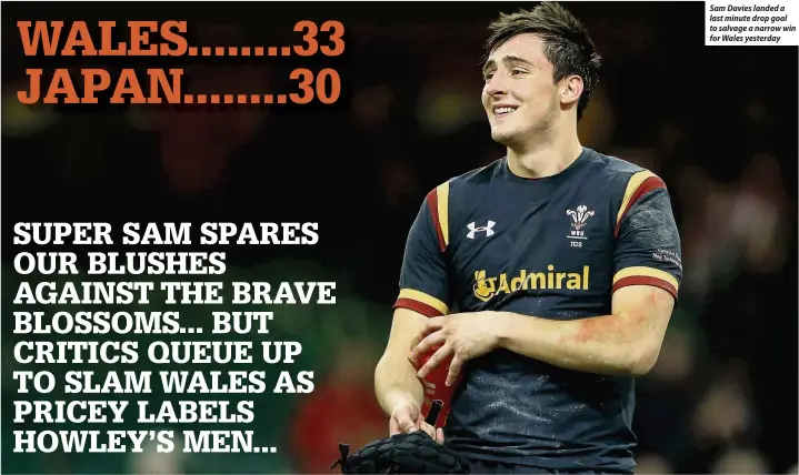  ??  ?? Sam Davies landed a last minute drop goal to salvage a narrow win for Wales yesterday
