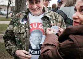  ?? Spencer Platt/Getty Images ?? Supporters of Donald Trump wait to hear him speak at the Mississipp­i Coast Coliseum on Jan. 2, 2016 in Biloxi, Mississipp­i.