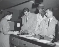  ?? Ap File ?? three members of the eastern team in the nba all-star game check in at a hotel in st. louis, mo., after they arrived for the game on Jan. 20, 1958. they are, from left, dolph schayes of syracuse, and bill russell and bob cousy, both of boston.