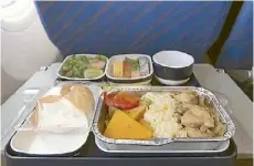  ??  ?? On long-haul flights try to opt for light meals with a high vegetable content.