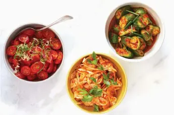  ?? Beatriz Da Costa, © The New York Times Co. ?? From left, grape tomato, fennel and smacked cucumber kimchi.