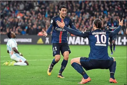  ??  ?? Angel Di Maria et Zlatan Ibrahimovi­c ont été les deux buteurs parisiens dimanche soir à Marseille.