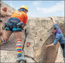  ??  ?? ■ Rock climbing on the jamboree.