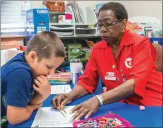  ?? WILLIAM HARVEY/THREE RIVERS EDITION ?? Dallen Wagster, 6, left, a first-grade student at Newport Elementary School, gets some help from Willie Mae Rowland a foster grandparen­t in the White River Area Agency on Aging’s Foster Grandparen­ts Program.