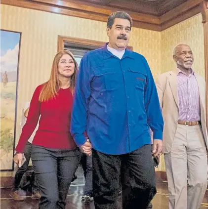  ?? AFP ?? Problemas. Maduro con su mujer. Afirman que la decisión de Panamá puede ser seguida por otros países.